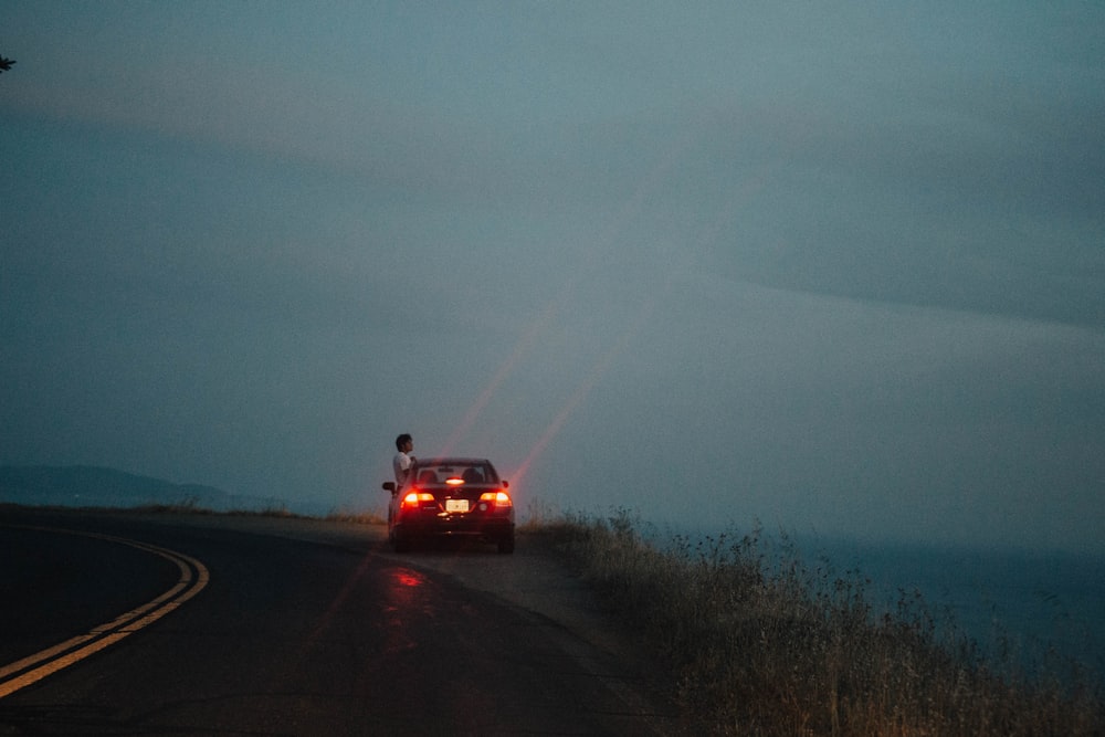 vehicle parked near cliff