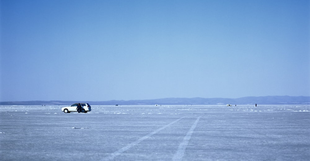 white vehicle on gray surface