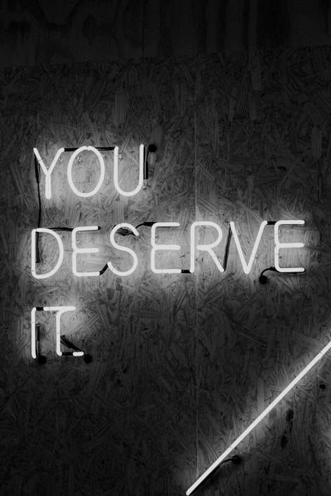 you deserve it signage