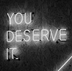 you deserve it signage