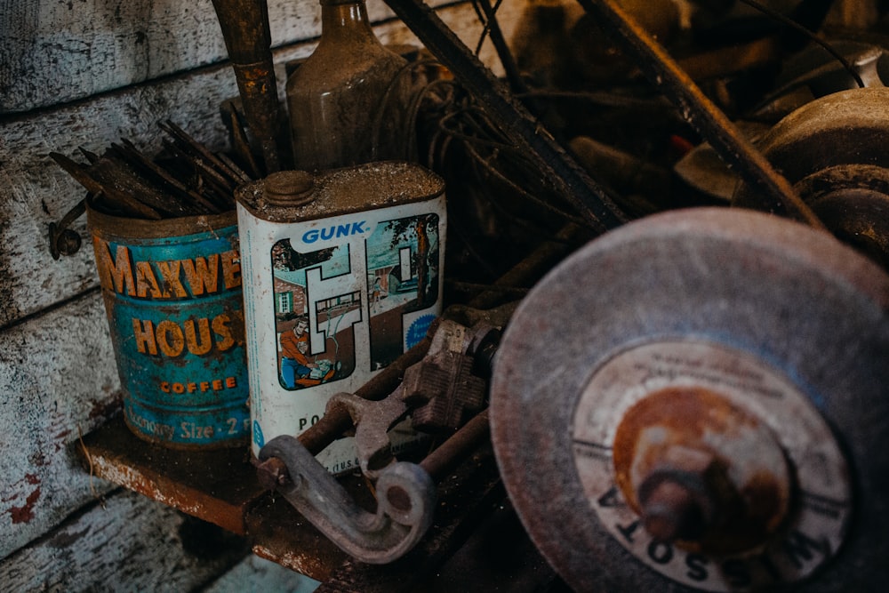 oil cans on metal surface