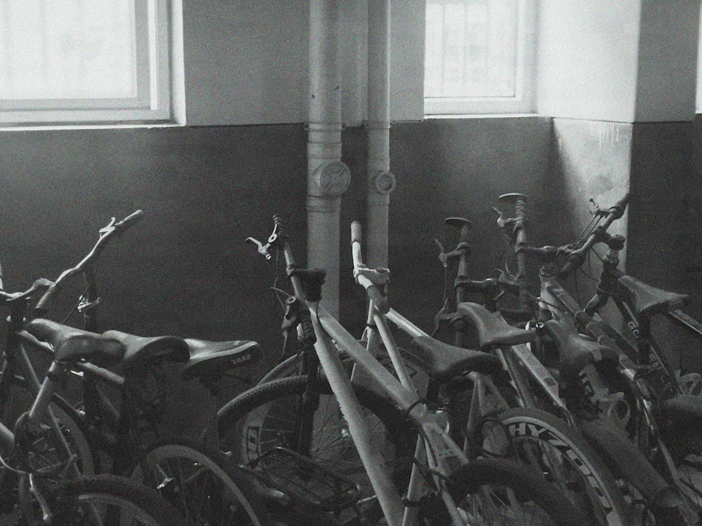 grayscale photography of bicycles