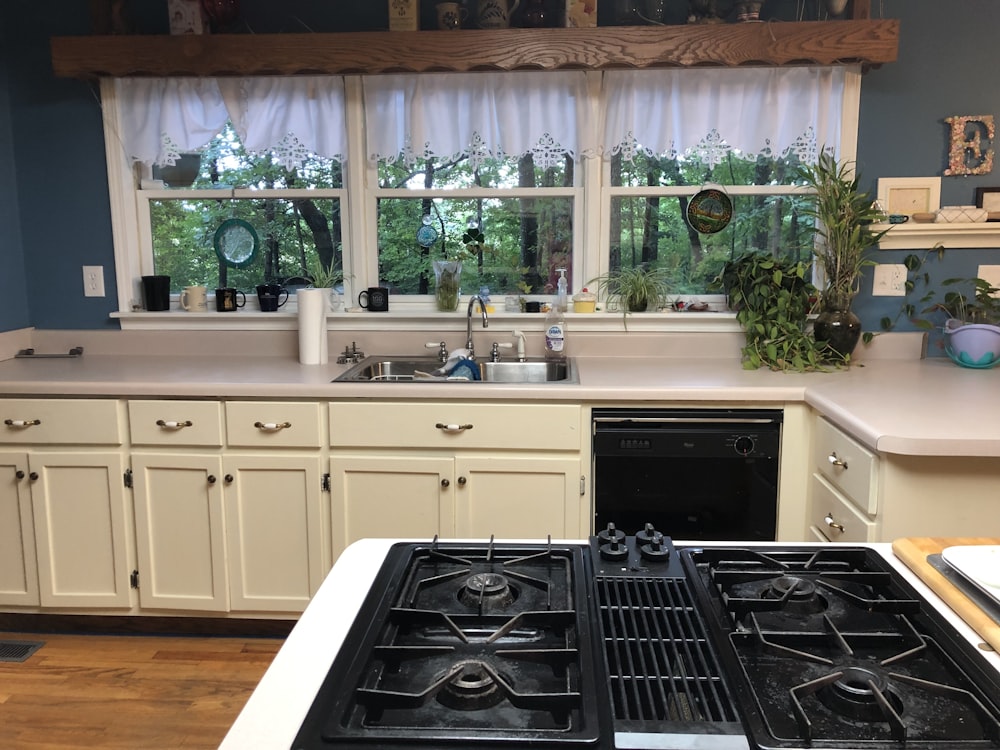 white wooden kitchen cabinets