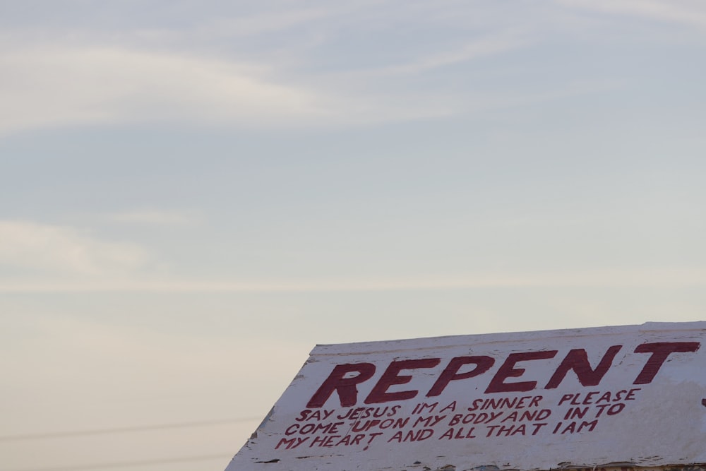 Repent signage during daytime