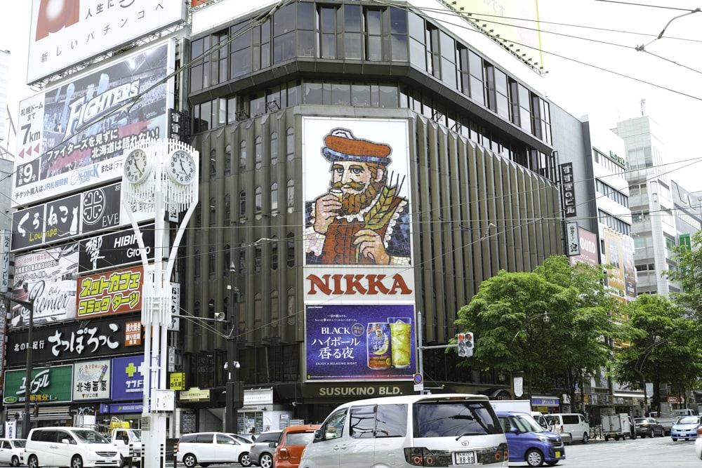 vehicles on road near building