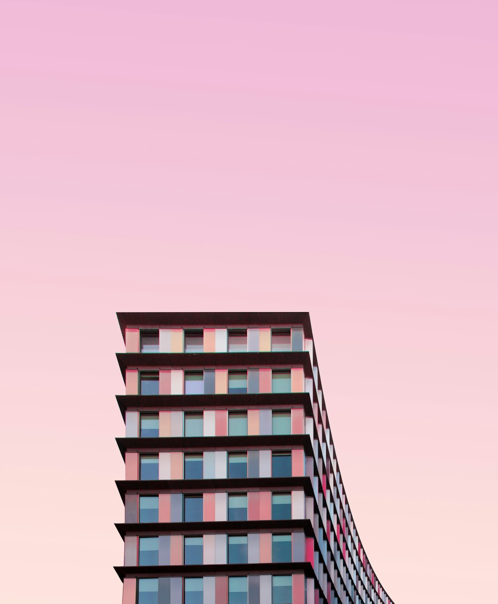 white and pink concrete building during daytime