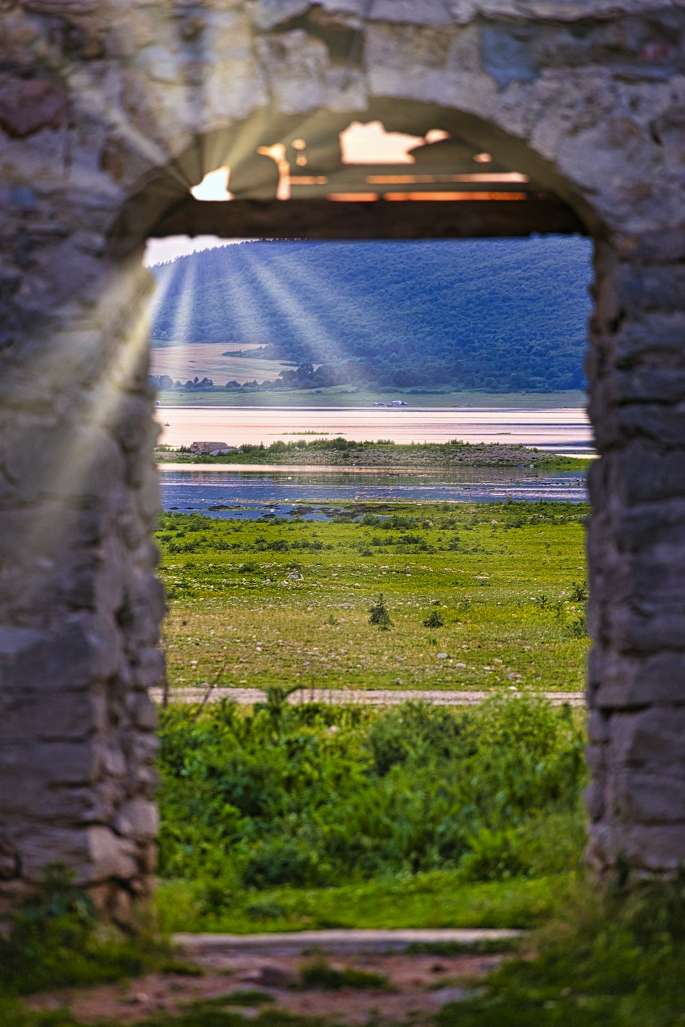 a view of a field through a window