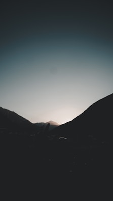 A serene sunset view from a hilltop destination.