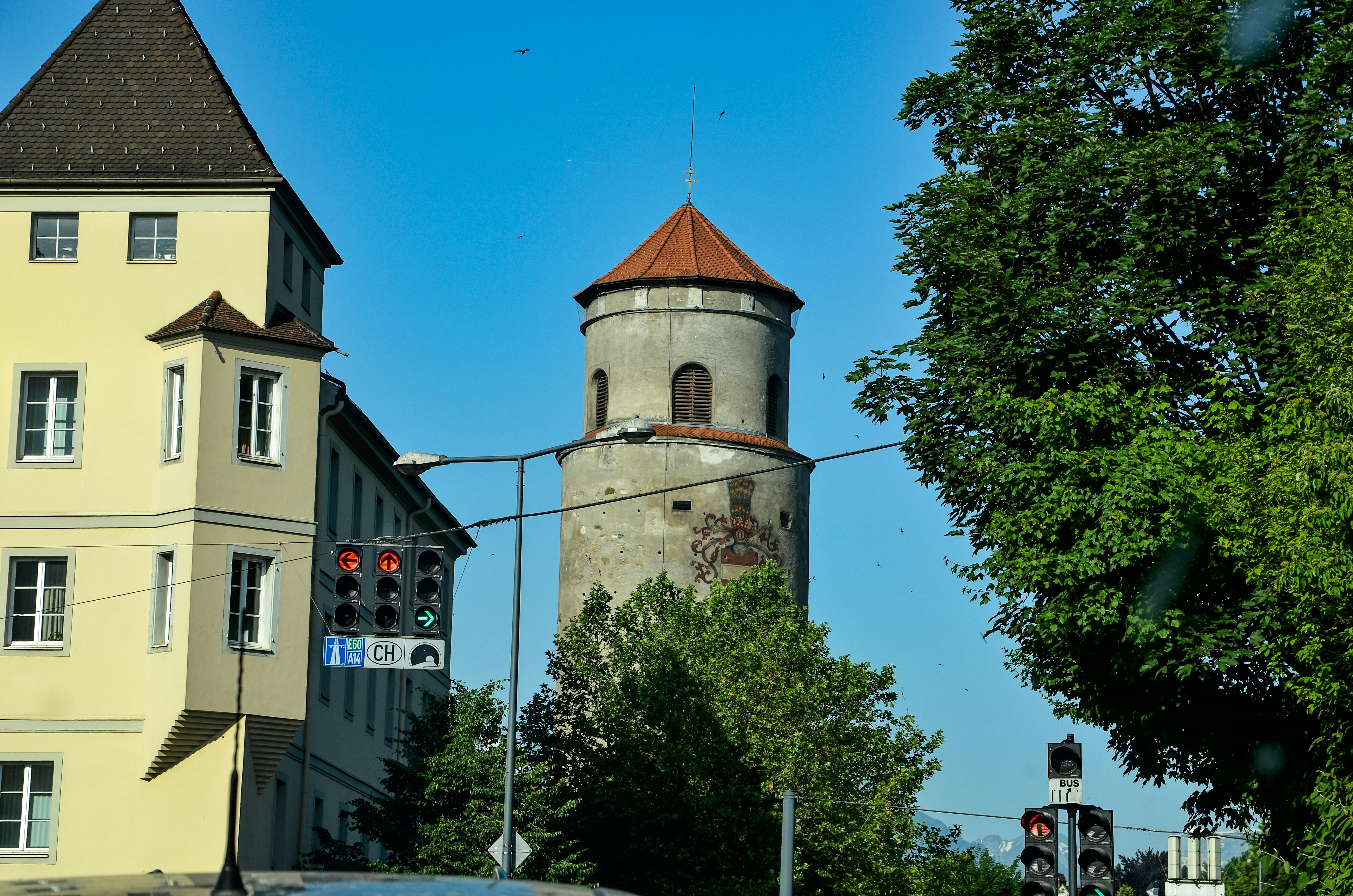 gray concrete tower near trees
