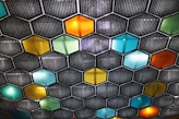 a close up of a wall made of hexagonal tiles