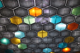 a close up of a wall made of hexagonal tiles