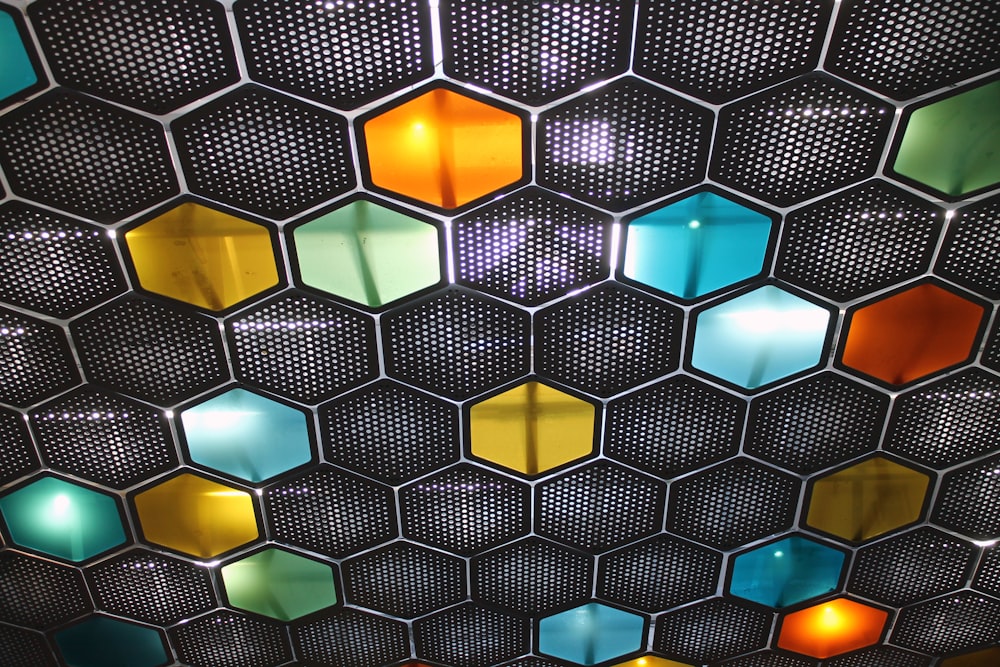 a close up of a wall made of hexagonal tiles