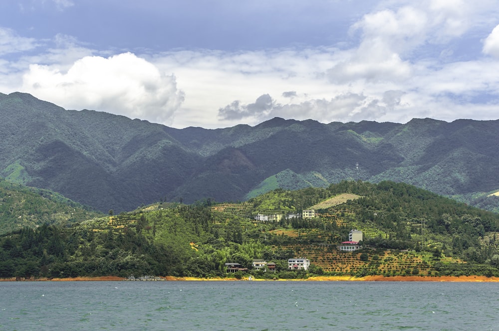 landscape photo of mountains under cloudy sky during daytime