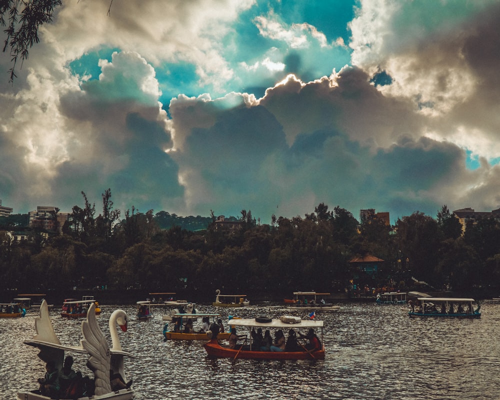 boats on calm body of water