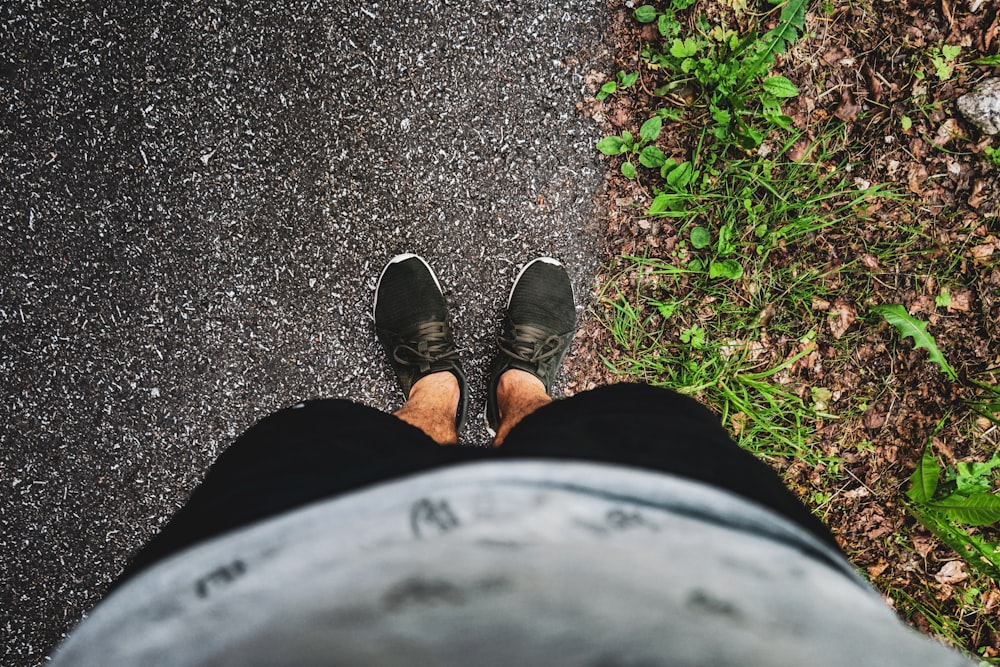 man wearing black shoes