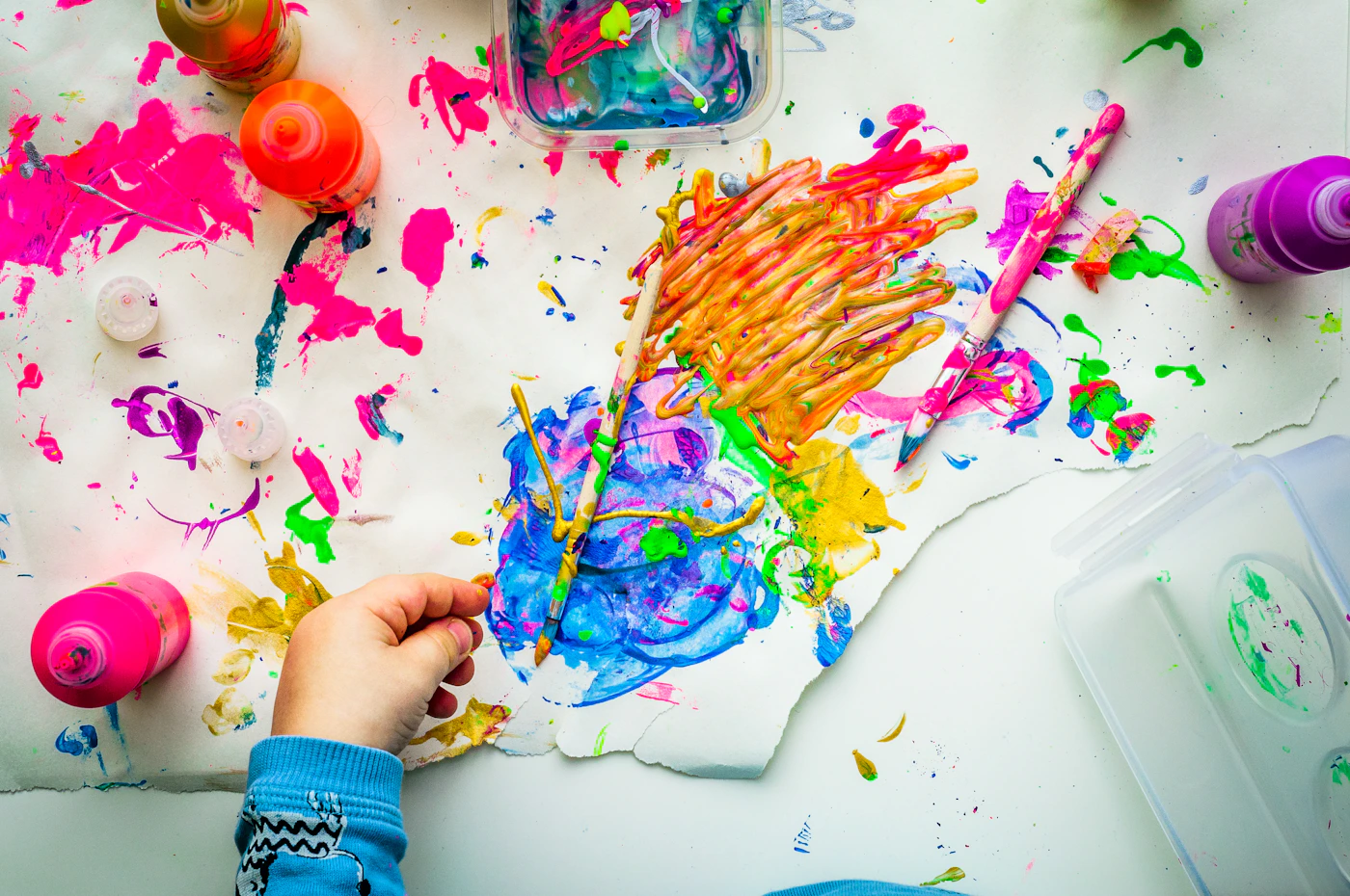 Bright art studio with tables and supplies