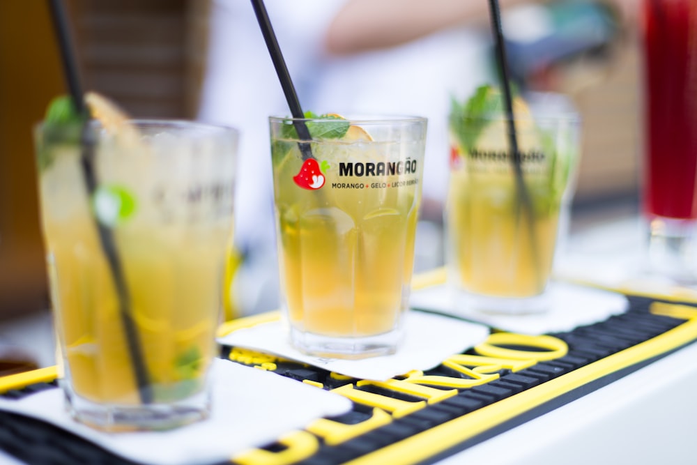 shallow focus photography of three drinking glasses