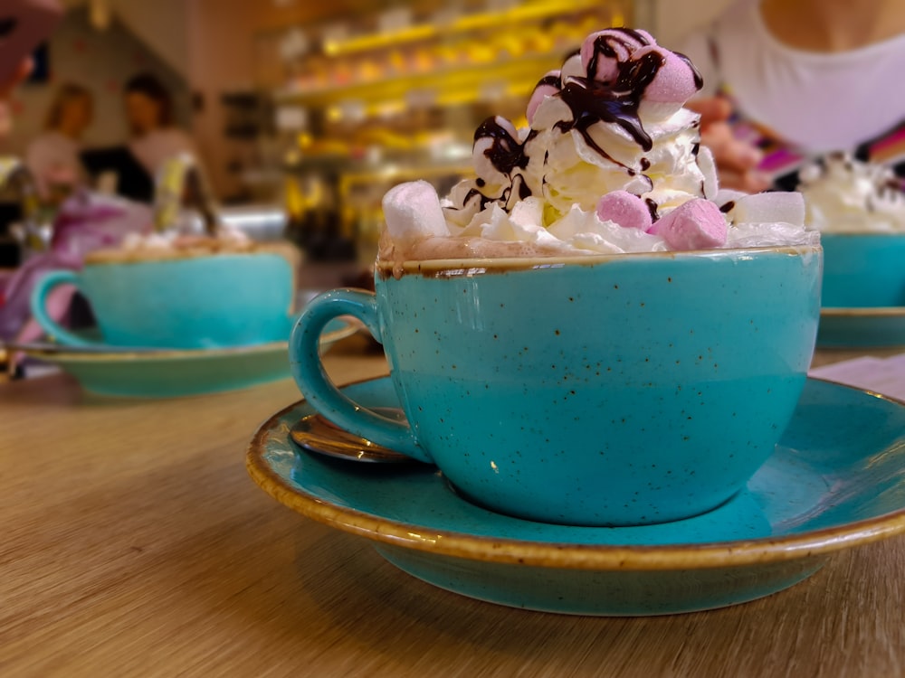 blue ceramic mug full of marshmallow