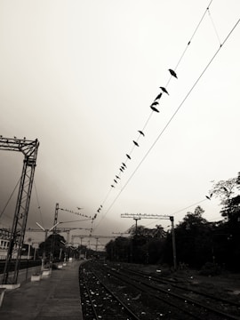 grayscale photography of train track