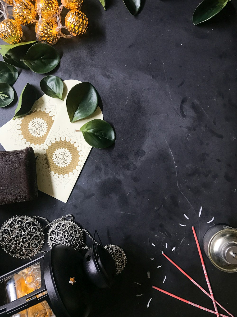 a black table topped with lots of different items