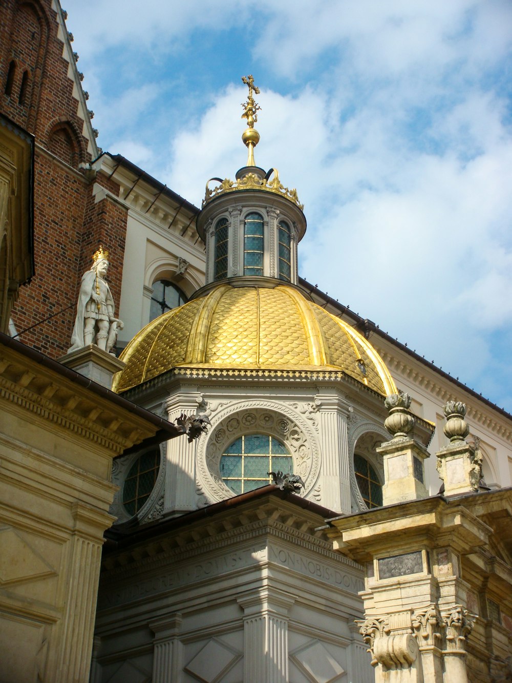 a large building with a gold dome on top of it