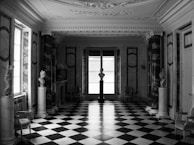 Wide shot of a luxurious room showcasing a perfectly restored green-hued stone floor.