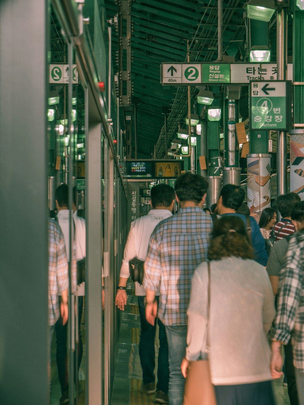 people walking near station during daytime