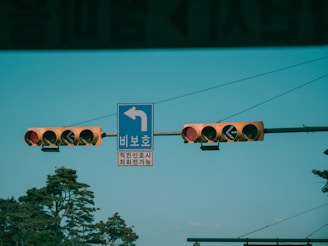 Traffic light system regulating vehicle movement at a gate.