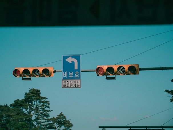 Traffic light system regulating vehicle movement at a gate.