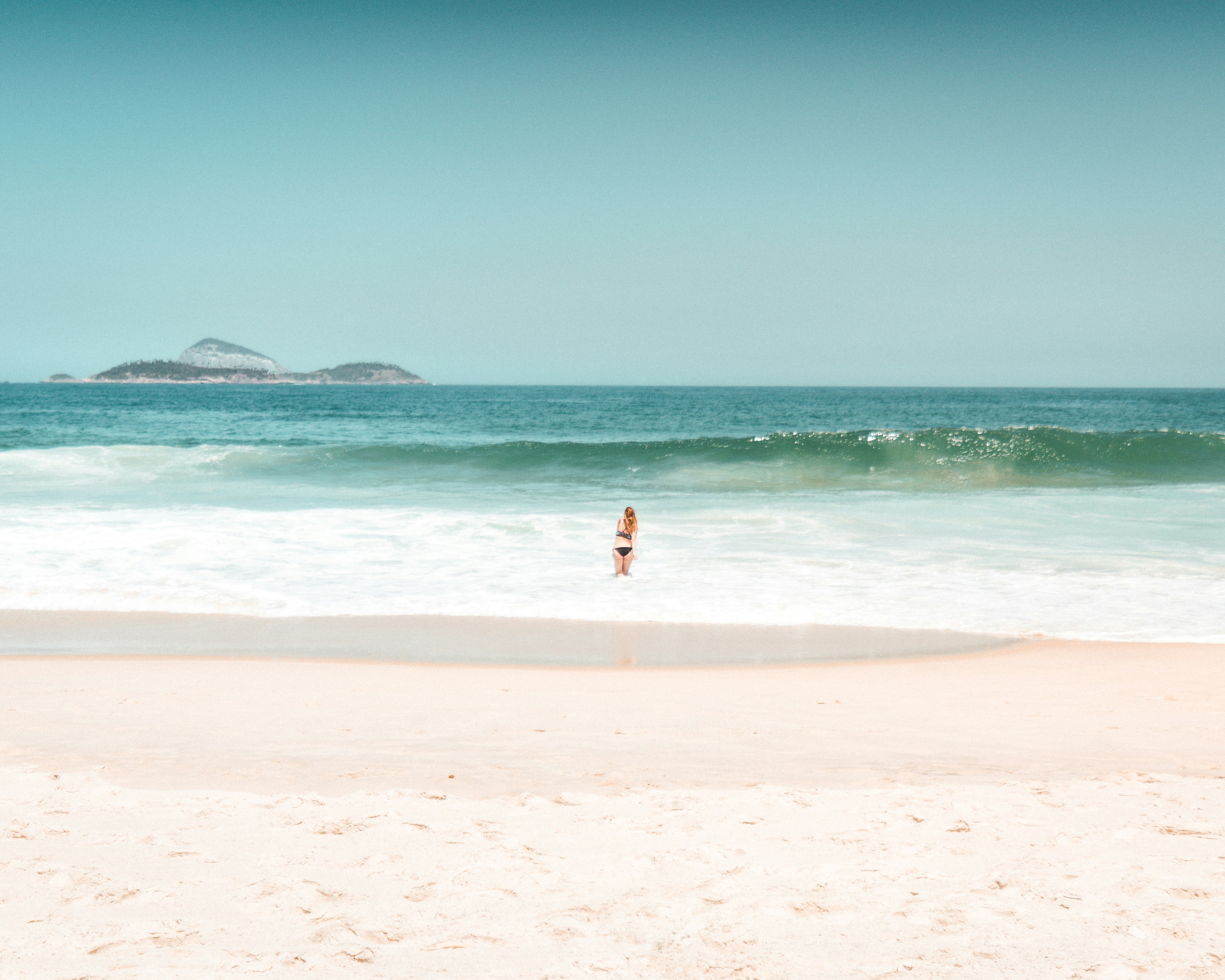 person standing on seaside