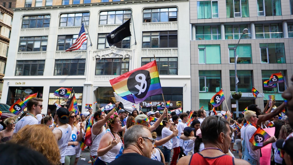 people holding pride flag