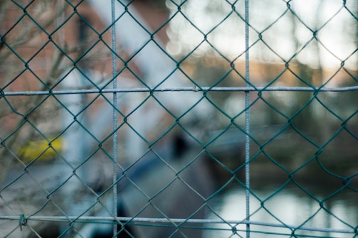 Wide shot of the chainlink fence installation demonstrating its robust and precise construction.