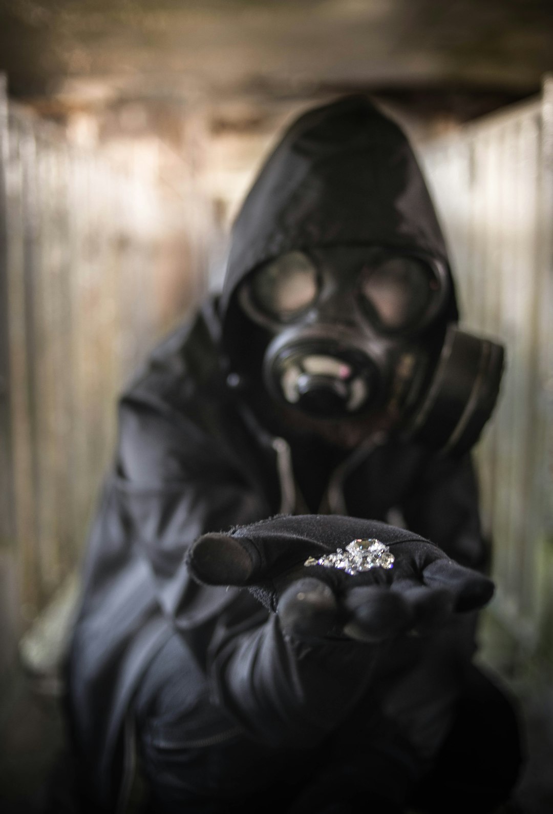person wearing a gas-mask close-up photography