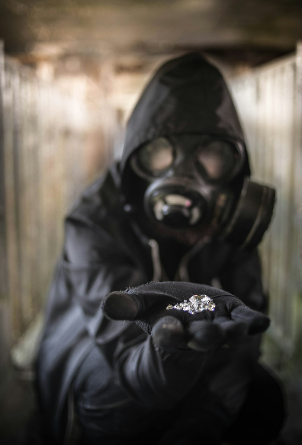 person wearing a gas-mask close-up photography