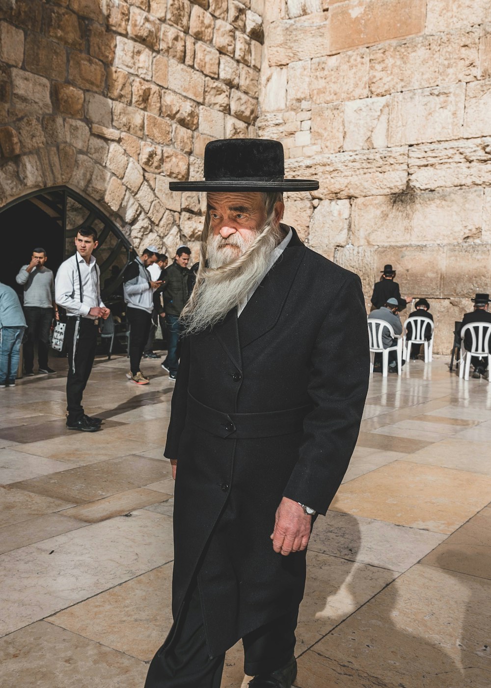 man wearing black coat