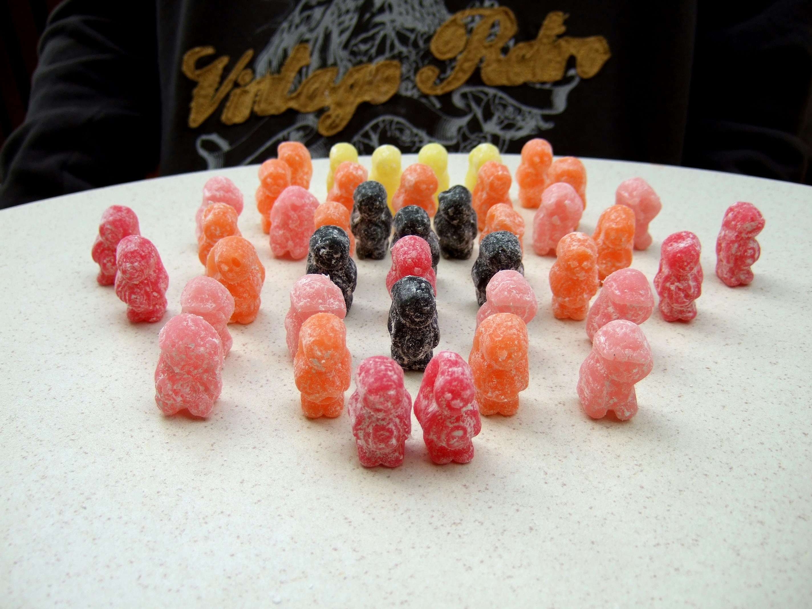 multicolored mini figure lot confectionery teams background