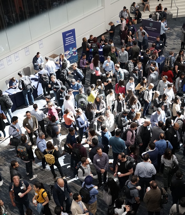 crowd of people in building lobby