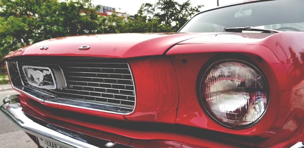 red Ford Mostang closeup photography