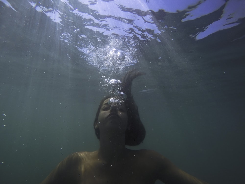 underwater photo of a woman