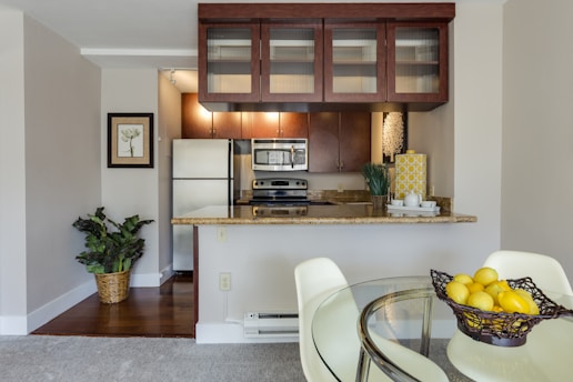 white and beige marble-top table