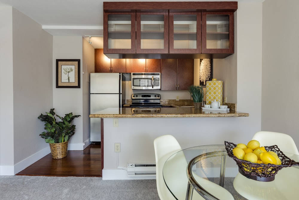 white and beige marble-top table