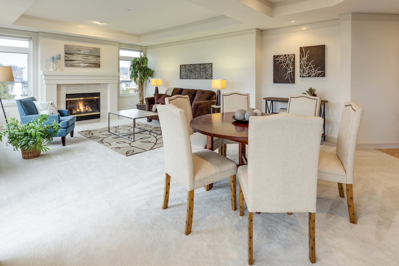 Modern luxury apartment interior with floor-to-ceiling windows overlooking Leeds cityscape