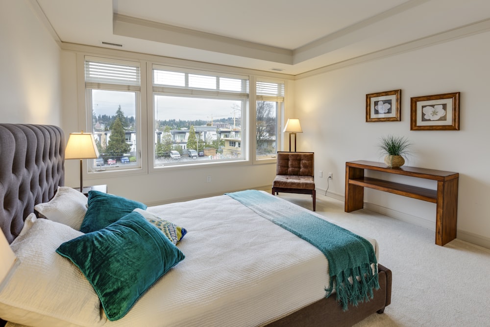 Bedroom with Two Green and White Pillows