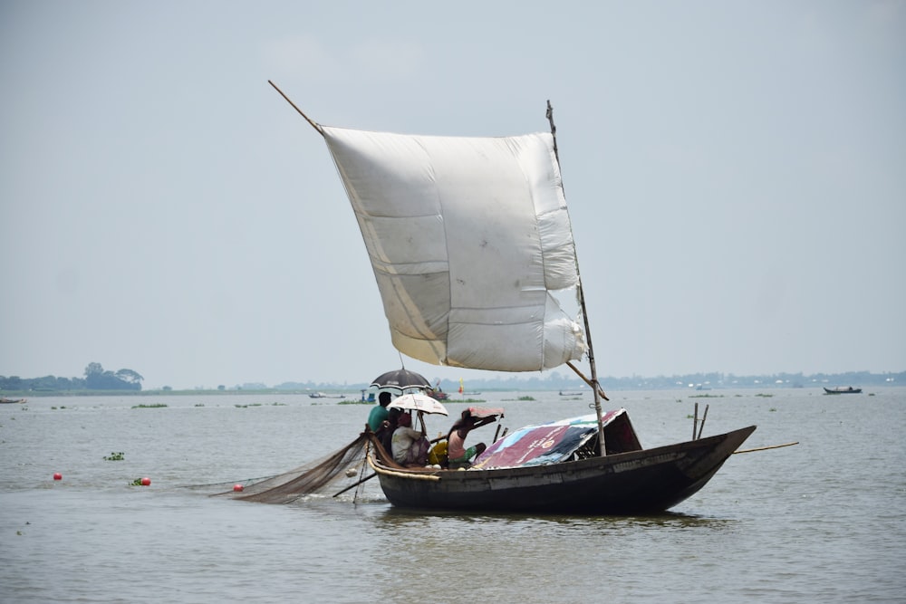 black boat on body of water