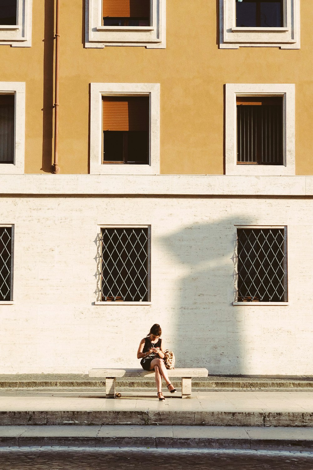 woman sitting on bench