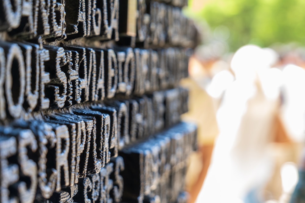 a close up of a stack of metal letters