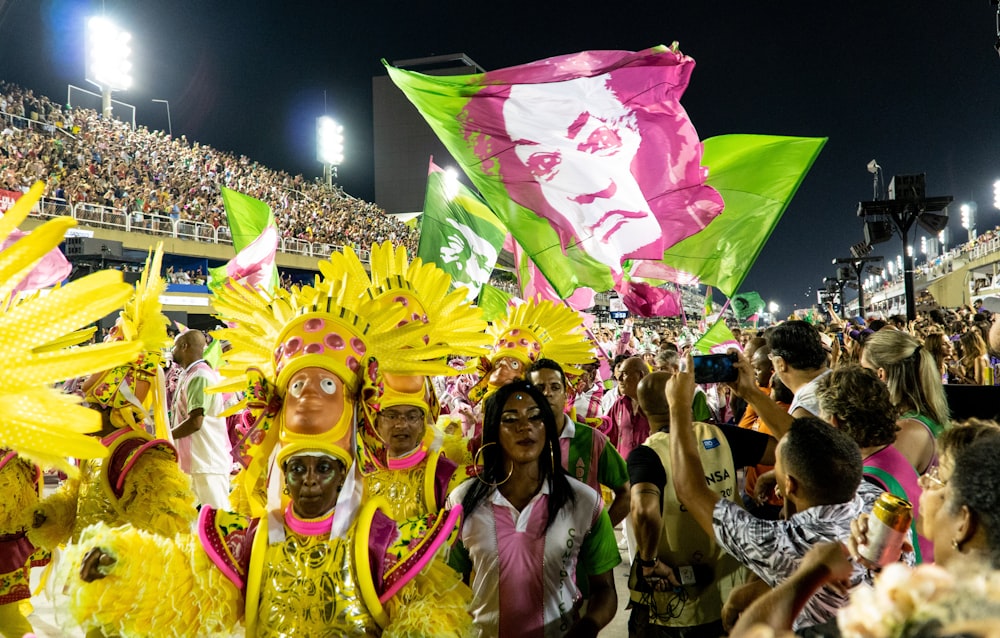 people wearing mask and holding flags