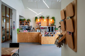 brown wooden wall rack across counter
