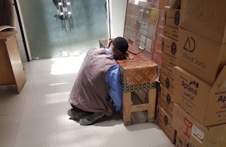 man sitting on floor