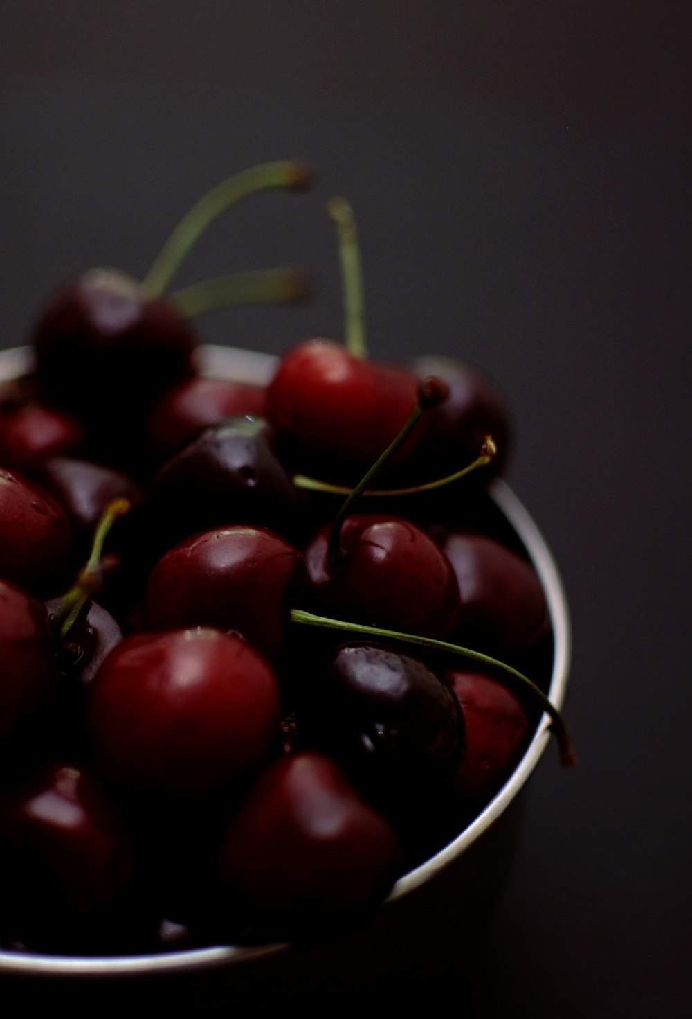shallow focus photo of red cherries
